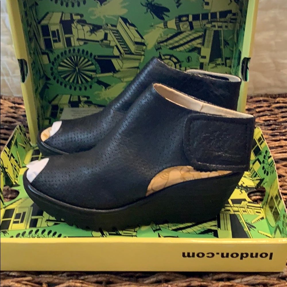 Fly London Mousse Black peep toe leather wedges